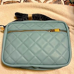 Light blue cross body, never used urban original vegan leather